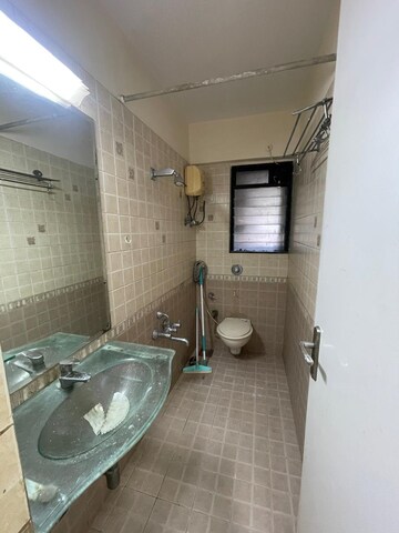 Bathroom in 1 BHK Apartment at Manavsthal Heights, Andheri East – for Rent