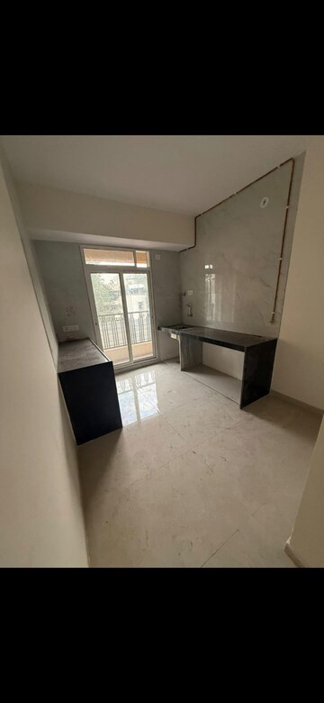Kitchen in 3 BHK Apartment at Ojass Awantika CHS, Naupada – for Rent
