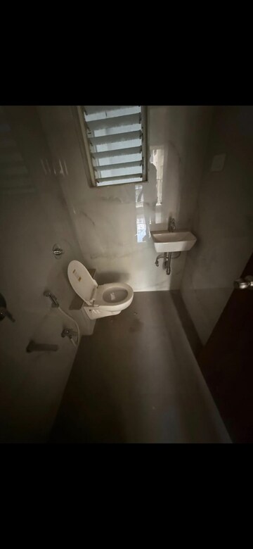 Bathroom in 3 BHK Apartment at Ojass Awantika CHS, Naupada – for Rent