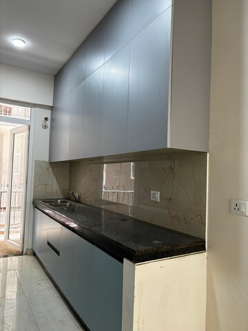 Kitchen in 3.5 BHK Apartment at Smart World Gems, Sector 89 – for Rent