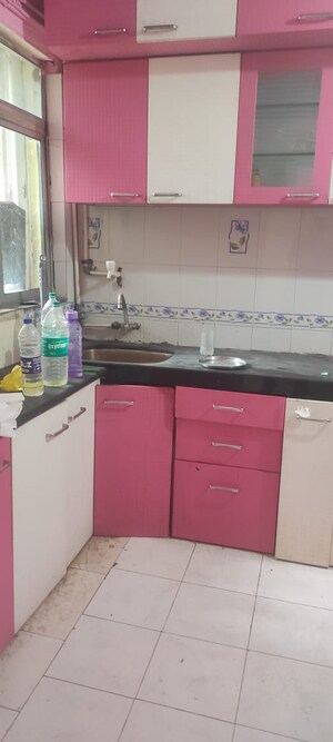 Kitchen in 1 BHK Apartment at Swastik Park CHS, Ghodbunder Road – for Sale