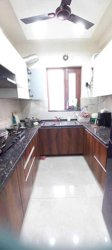 Kitchen in 2 BHK Builder Floor at RPS Palm Drive, Sector 88 – for Rent