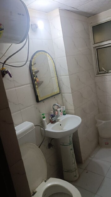 Bathroom in 3 BHK Apartment at Aims Golf Avenue II, Sector 75 – for Rent