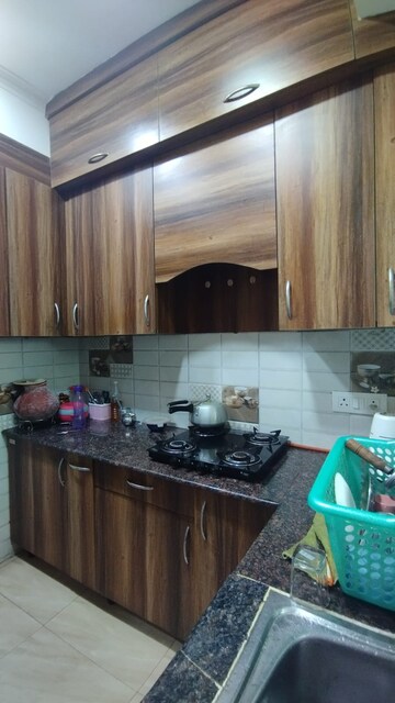 Kitchen in 2 BHK Apartment at Gaur Atulyam, Omicron I Greater Noida – for Sale