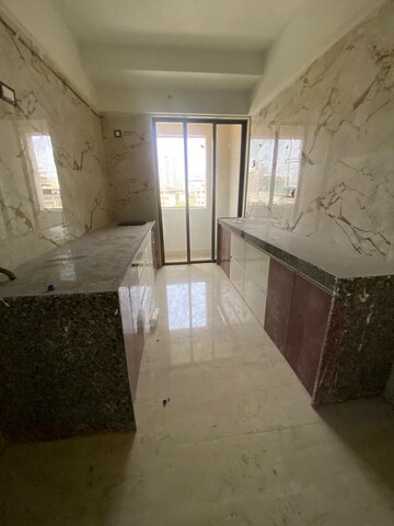 Kitchen in 2.5 BHK Apartment at Kalpataru Srishti, Mira Road – for Rent