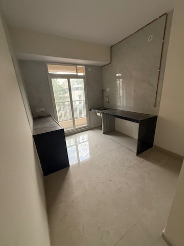 Kitchen in 2 BHK Apartment at Laxmi Narayan Tower, Naupada – for Rent