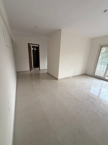 Living Room in 2 BHK Apartment at Laxmi Narayan Tower, Naupada – for Rent