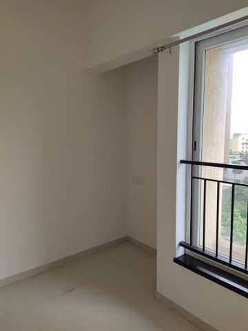 Room in 2 BHK Apartment at Rustomjee Azziano Wing D, Thane West – for Rent