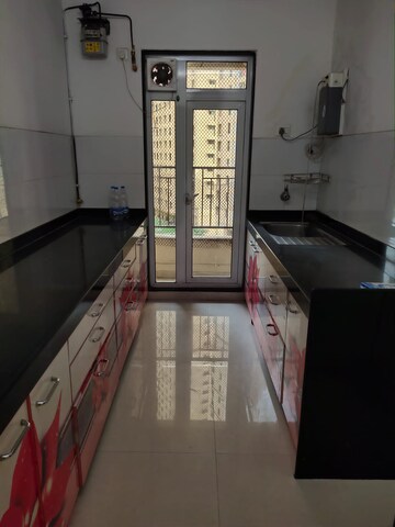 Kitchen in 2 BHK Apartment at Rustomjee Azziano Wing D, Thane West – for Rent