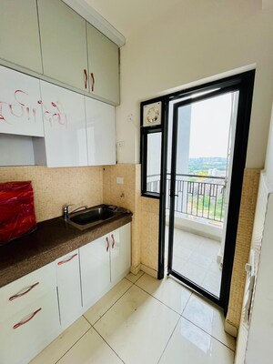 Kitchen in 2 BHK Apartment at ATS Happy Trails, Sector 10 Greater Noida – for Sale
