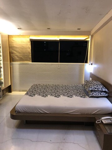Bedroom in 2 BHK Apartment at Navyug Mansion, Grant Road West – for Sale