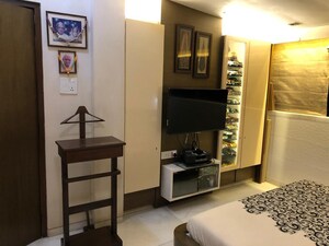 Living Room in 2 BHK Apartment at Navyug Mansion, Grant Road West – for Sale
