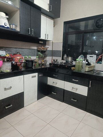 Kitchen in 1 BHK Apartment at Shreeji Tower, Panchsheel Nagar – for Rent