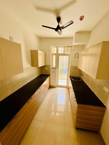 Kitchen in 3 BHK Apartment at ATS Happy Trails, Sector 10 Greater Noida – for Sale