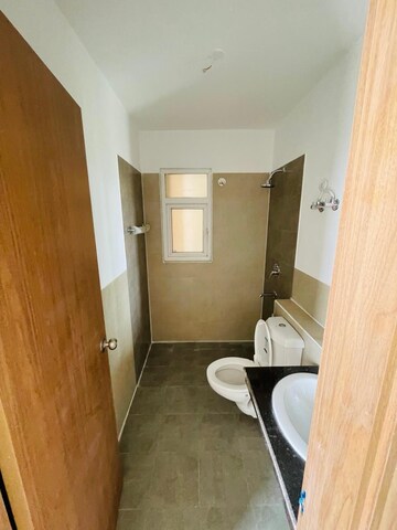 Bathroom in 3 BHK Apartment at ATS Happy Trails, Sector 10 Greater Noida – for Sale