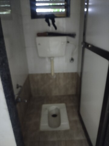 Bathroom in 1 BHK Apartment at Hari Aditi Garden, Karanjade – for Rent