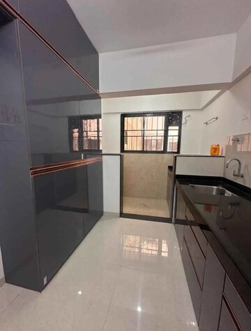 Kitchen in 2 BHK Apartment at Kohinoor Viva City, Dhanori – for Rent