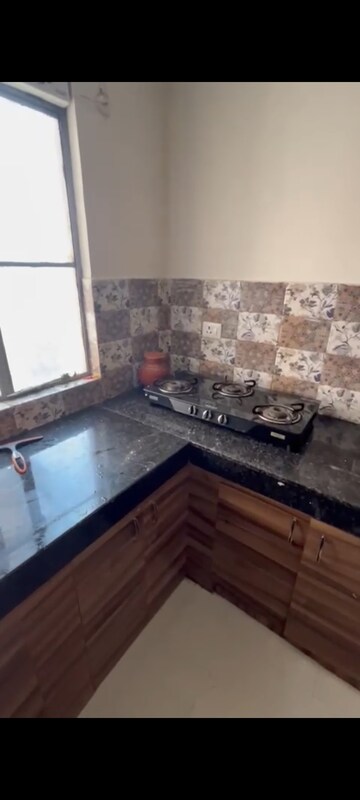 Kitchen in 2 BHK Apartment at Signature Global Synera, Sector 81 – for Rent