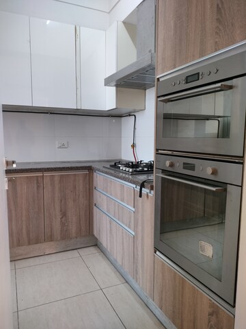 Kitchen in 3 BHK Apartment at Mahindra Aura, Sector 110a – for Rent