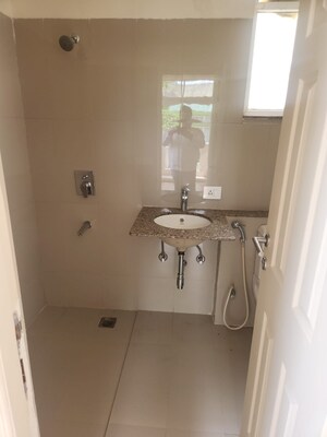 Bathroom in 3 BHK Apartment at Mahindra Aura, Sector 110a – for Sale