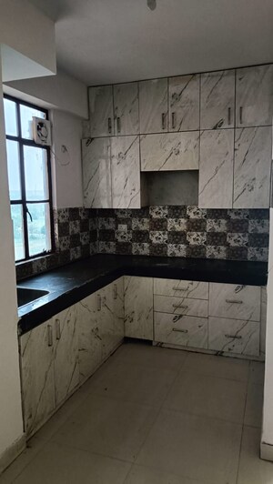 Kitchen in 2.5 BHK Apartment at Signature Global Synera, Sector 81 – for Sale