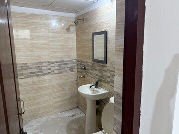 Bathroom in 3 BHK Apartment at Mahagun Mirabella, Sector 79 – for Rent