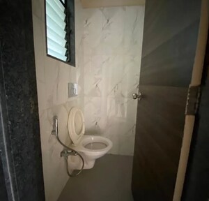 Bathroom in 1 BHK Apartment at Dosti Desire Joy, Brahmand – for Sale