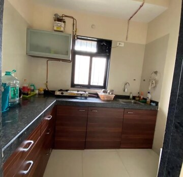 Kitchen in 1 BHK Apartment at Dosti Desire Joy, Brahmand – for Sale