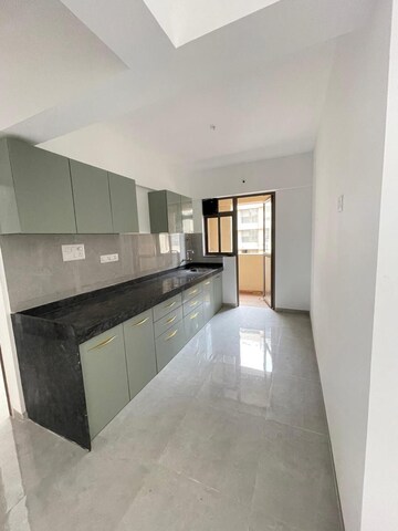 Kitchen in 3 BHK Apartment at Ganga New town, Dhanori – for Rent