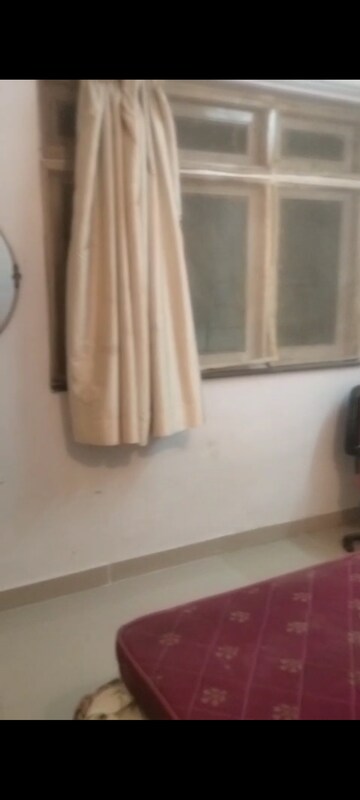 Living Room in 2 BHK Apartment at Snehdhara CHS, Vile Parle West – for Rent