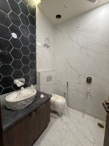 Bathroom in 3 BHK Builder Floor at Paschim Vihar – for Sale