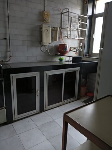 Kitchen in 1 BHK Apartment at Gomantashram Apartment, Vile Parle East – for Rent