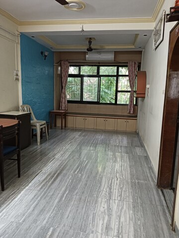 Bedroom in 1 BHK Apartment at Gomantashram Apartment, Vile Parle East – for Rent