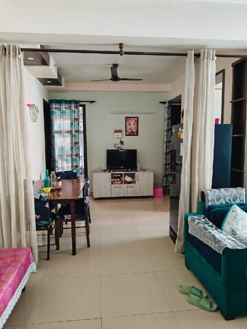 Living Room in 2.5 BHK Apartment at Crossing Republik, Crossing Republic – for Sale