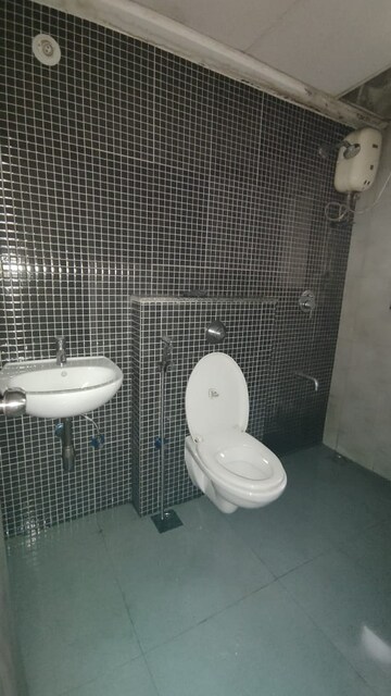 Bathroom in 1.5 BHK Apartment at Lodha Lakeshore Greens, Dombivli East – for Rent