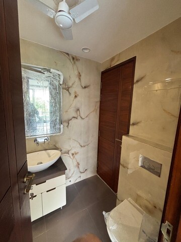 Bathroom in 4 BHK Builder Floor at Janakpuri – for Sale