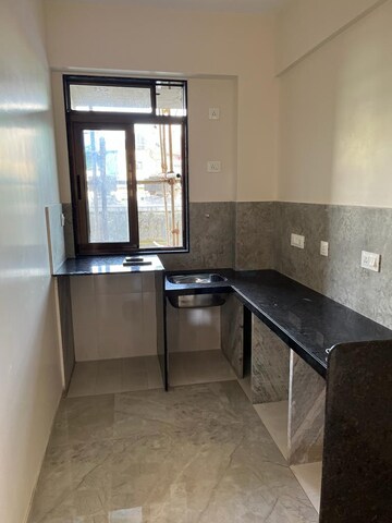 Kitchen in 1 BHK Apartment at Ajmera Downtown, Marine Lines – for Sale