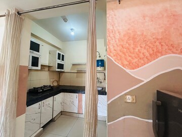 Kitchen in 2 BHK Apartment at Gaur City 2 - 16th Avenue, Sector 16c Greater Noida – for Rent