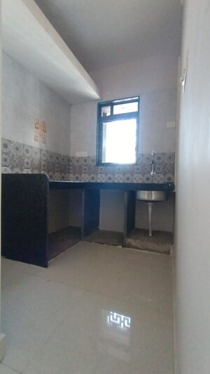 Kitchen in 1 BHK Apartment at SPS White Carnation, Ulwe – for Sale