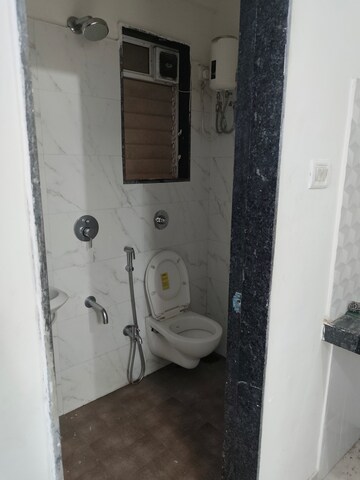 Bathroom in 1 BHK Apartment at Tandice 69 Residency, Andheri East – for Rent