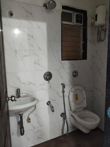 Bathroom in 1 BHK Apartment at Tandice 69 Residency, Andheri East – for Rent