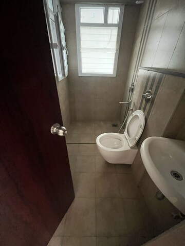 Bathroom in 2 BHK Apartment at Puravankara Silversands, Mundhwa – for Rent