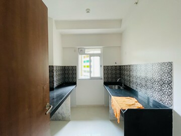 Living Room in 1 BHK Apartment at Lodha Amara New Tower, Kolshet Industrial Area – for Rent