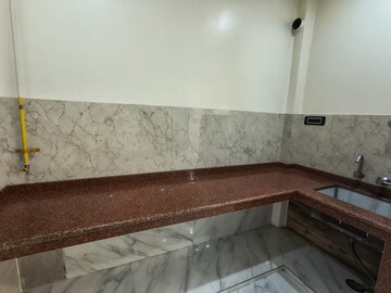 Kitchen in 2 BHK Apartment at Parsvnath Royale Floors, Uattardhona – for Rent