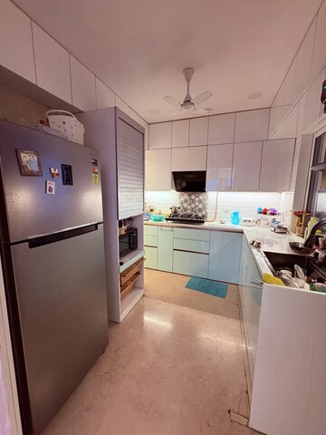 Kitchen in 3 BHK Apartment at Soham Crystal Spires, Ghodbunder Road – for Rent