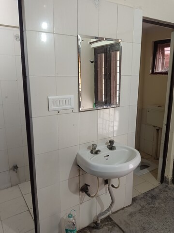 Bathroom in 1 BHK Apartment at Mohan Park – for Rent
