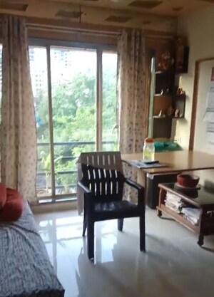 Living Room in 2 BHK Apartment at Agarwal Krish Garden, Nalasopara West – for Sale