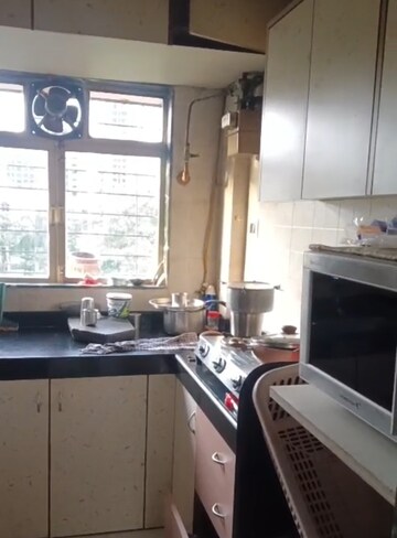 Kitchen in 2 BHK Apartment at Agarwal Krish Garden, Nalasopara West – for Sale