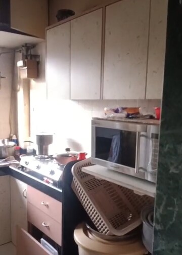 Kitchen in 2 BHK Apartment at Agarwal Krish Garden, Nalasopara West – for Sale
