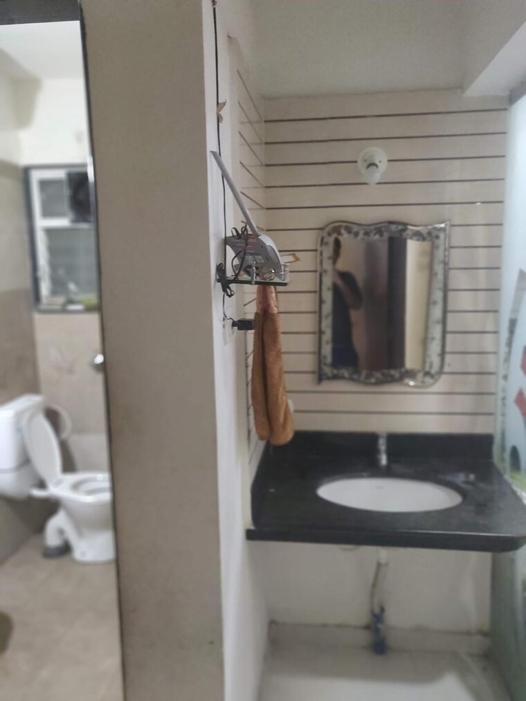 Bathroom, gk-dwarka-sai 2 Bedroom 709 Sq.Ft. Apartment In Rahatani Pune 9078395